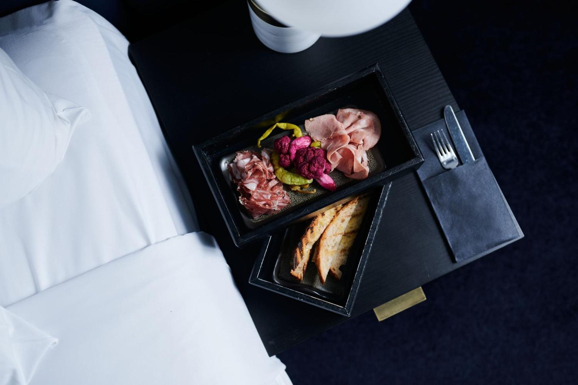 Midnight Hotel, Autograph Collection Канберра Екстер'єр фото A first-class meal on board a Lufthansa plane